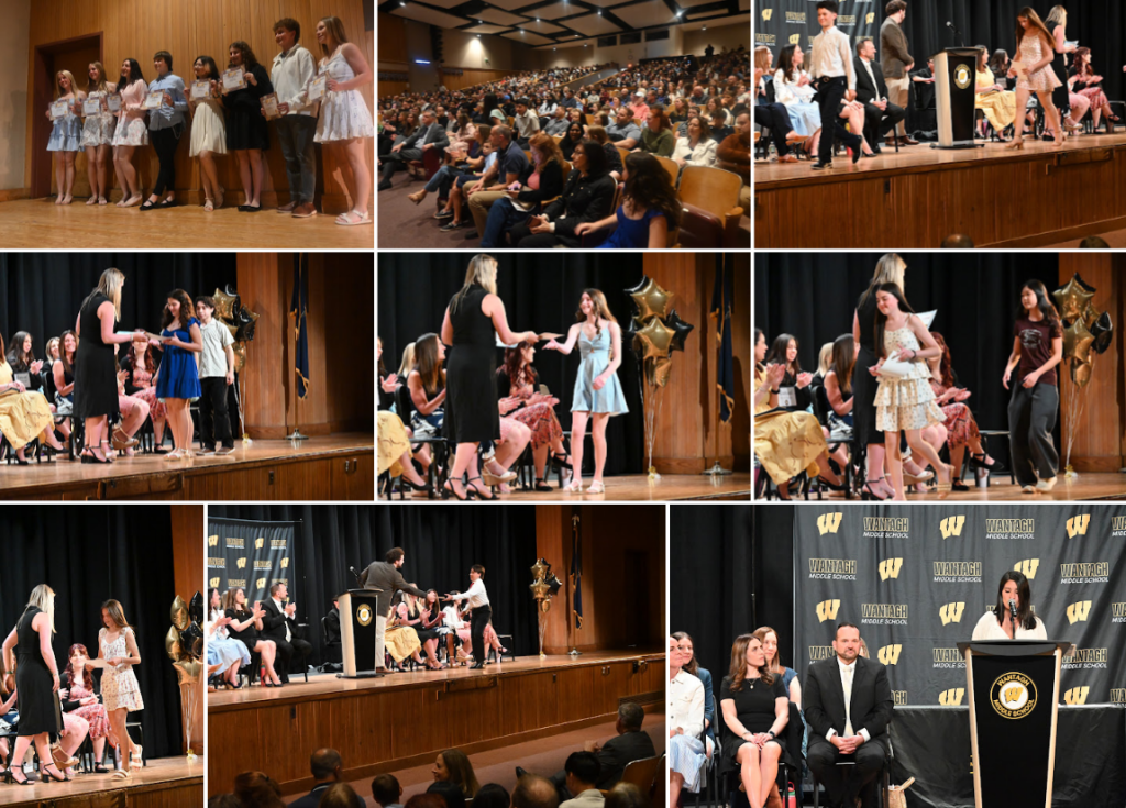 students receiving awards on stage